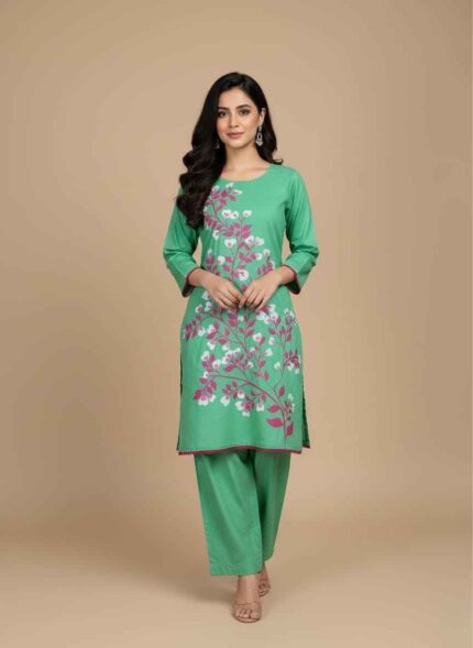 Women's light green 2 piece hand painted cotton suit with pink Close up of hand painted white and pink flowers on cotton fabric artElegant light green cotton shirt with hand painted vine and lace trimArtisan crafted hand painted 2 piece suit for women in PakistanLight green cotton trouser and shirt set with unique floral hand painting2 pc hand painted cotton suit Pakistan