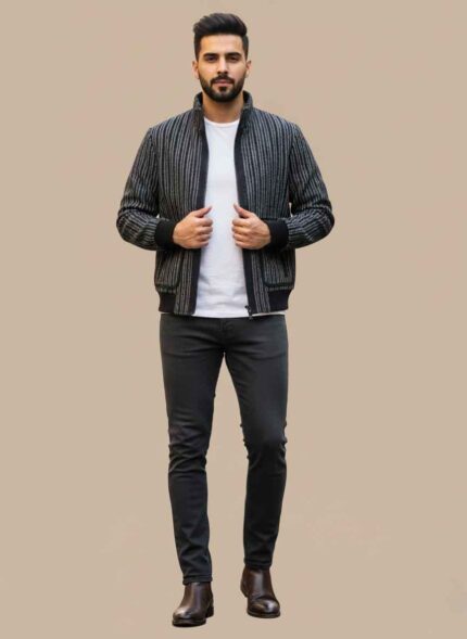 Front view of Gelani's black wool jacket for men on a blue background. Close-up of the premium mix wool stitching on a men's winter jacket. Stylish black stitched jacket for men showing zipper and pocket details. Plus size men's black winter coat available in sizes XL to 4XL. Gelani's brand winter collection black jacket for the Pakistani market. black jacket for men