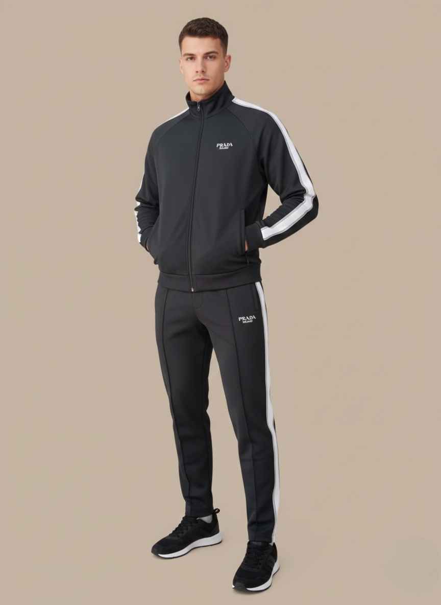 A high-quality image of a black two-piece designer tracksuit set featuring prominent white stripes on the sleeves and legs.
