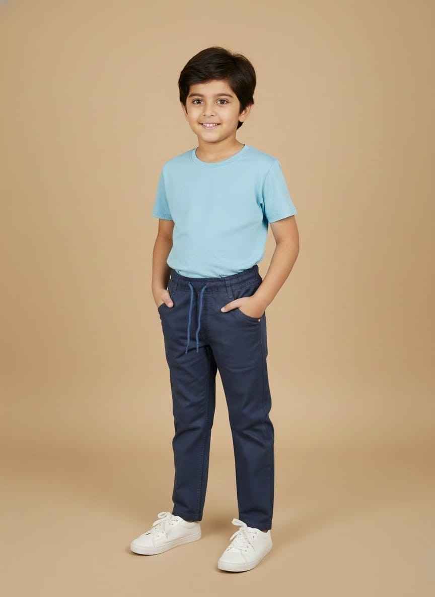 Boys dark blue stretchable denim jeans with elastic waistbandGelani kids boy slim fit winter denim pants in dark blueFront view of stretchable boys jeans with drawstring waistHigh-quality boys dark blue denim for winter season PakistanClose-up of stitching and pocket detail on Gelani boys jeansboys dark blue stretchable jeans Pakistan