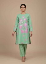Light green women's cotton kurti with large pink hand painted Detailed view of handcrafted floral painting on light green cotton fabric. .Pakistani artisan hand painted 1 piece cotton shirt in light green.Elegant light green kurti for women featuring artistic hand painted motifs.Casual wear hand painted cotton kurti for women in Pakistan. hand painted cotton kurti pakistan