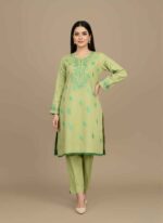 Women's light pista 2 piece cotton suit with hand painted pink flowers.Hand painted cotton suit pakistan in refreshing light pista green.Detailed view of handcrafted floral art on a light green cotton kameez.Artisan made 2pc cotton outfit with hand painted nature motifsClose up of hand painted sleeve and neck detailing on cotton fabric.hand painted cotton suit pakistan