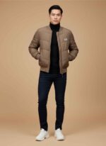 Brown quilted parachute jacket for men by Gelani's front view Men's winter stitched parachute jacket in earthy brown tone Close up of zipper and stitching on a parachute puffer jacket Full sleeve ribbed cuff detail on men's parachute outerwear Gelani's branded winter jacket for men available in large sizes parachute jacket for men