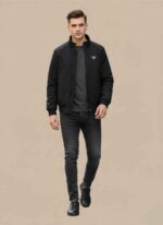 Gelani's black parachute jacket for men with full-zip front and stand-up collar Men's winter stitched black jacket in durable windproof parachute fabric Plus size XXL black parachute jacket for men for Pakistan winter Close up of zipper and pocket detail on a black parachute jacket Stitched winter outerwear for men in XXXL size by Gelani's brand parachute jacket for men