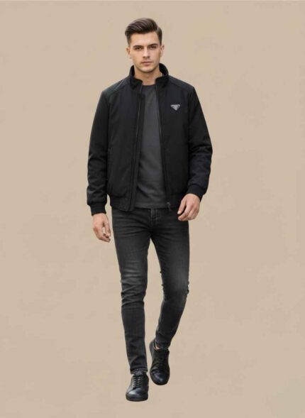 Gelani's black parachute jacket for men with full-zip front and stand-up collar Men's winter stitched black jacket in durable windproof parachute fabric Plus size XXL black parachute jacket for men for Pakistan winter Close up of zipper and pocket detail on a black parachute jacket Stitched winter outerwear for men in XXXL size by Gelani's brand parachute jacket for men