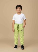 Men's parrot green winter joggers with black drawstring and elastic waist.Close-up of circular logo patch on parrot green Terry fleece trousers.