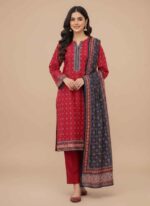 Bin Saeed red three-piece Khaddar suit with small white and blue geometric prints. Close-up of the shirt's V-neckline and printed border on the cuff and hem. Folded, stitched Khaddar kurta (shirt) in vibrant red with contrasting blue patterns. Matching dark blue printed Khaddar dupatta complementing the red suit. Stitched red Khaddar suit for women, a complete winter ensemble by Bin Saeed. 3 Pc Stitched Khaddar Suit
