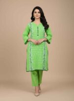 Parrot green hand painted cotton shirt with floral motifs Gelanis Stitched 2pc women cotton suit for Pakistani summer fashion Detailed view of handcrafted textile painting on green cotton fabric Relaxed fit free size women suit in breathable parrot green cotton Gelanis artisanal stitched summer collection for women in Pakistan hand painted stitched cotton suit