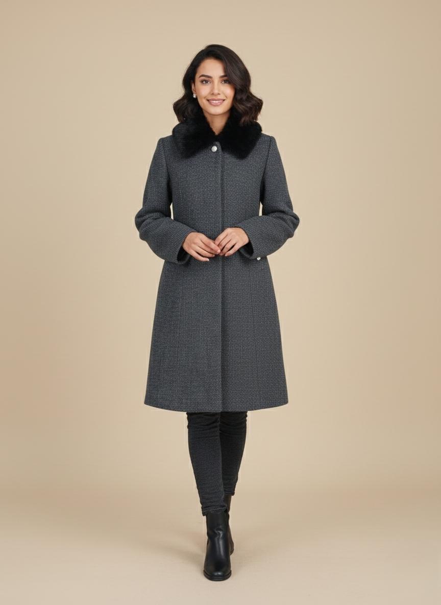 Product photo of a relaxed-fit beige V-neck knit coat with a chunky texture, four brown buttons, and two patch pockets.