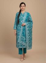 Women's teal blue 3 piece unstitched khaddar suit by Pehnawa by Palwasha Close-up texture of premium winter khaddar fabric in teal blue Unstitched 3 piece winter collection for women in Pakistan Teal blue khaddar shirt and trouser fabric with matching dupatta Pehnawa by Palwasha authentic unstitched winter wear for ladies 3 unstitched khaddar suit