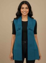 Women's Zinc colored lamb wool sweater with fur collar Black stitched winter sweater for women by Gelani's Off-white luxury wool sweater with deep front pockets Skin color free size lamb wool sweater for Pakistani winter Close-up of premium lamb wool fabric and fur lining details lamb wool sweater