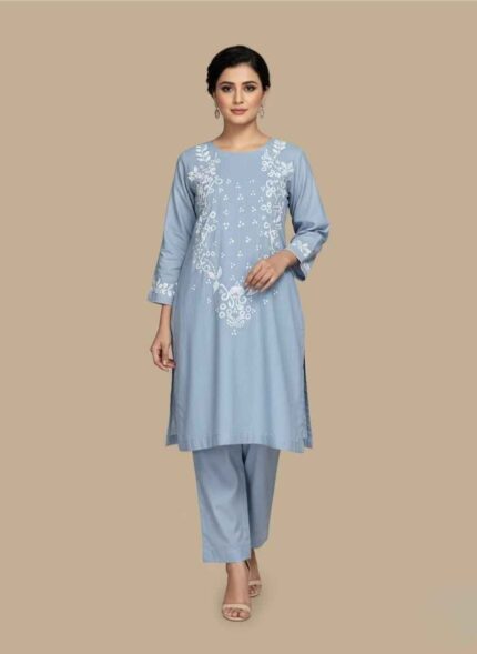 Women's light gray 2 piece hand painted cotton suit with white neck artClose-up of white hand-painted floral vine patterns on gray cotton fabricFront view of light gray cotton shirt with artistic hand-painted necklineArtisan crafted hand painted 2 piece ethnic wear for ladies in PakistanLight gray cotton trouser and shirt set with unique white hand painting2 pc hand painted cotton suit Pakistan