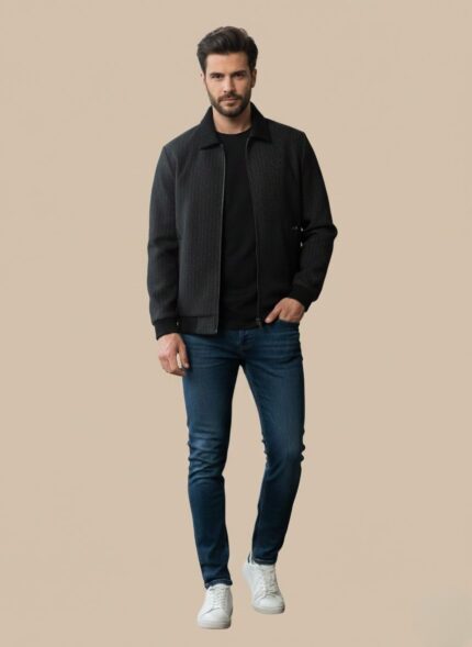 Close-up view of a dark charcoal/black Men's Pinstripe Jacket with vertical pinstripes, featuring a zip-up front, textured collar, and zippered pockets.