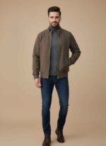 Main Image: Front view of Gelani's Brown Jacket for Men with silver zipper and ribbed cuffs. Detail Shot: Close-up of the premium wool fabric texture and stitching on the brown winter jacket. Collar Detail: Ribbed stand-up collar and high-quality zipper detail of the men's woolen jacket. Cuff and Hem: Elasticated ribbed hem and cuffs of the stitched brown jacket for winter. Pocket View: Neatly integrated side-entry pockets on the Gelani's brown wool jacket for men. Brown Jacket for Men