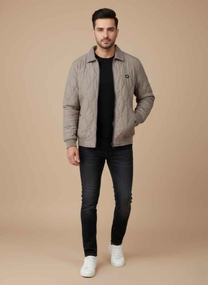 Gelani's black parachute jacket for men with full-zip front and stand-up collar Men's winter stitched skin color jacket in durable windproof parachute fabric Large size black parachute jacket for men for Pakistan winter Close up of zipper and pocket detail on a premium parachute jacket Stitched winter outerwear for men in XL size by Gelani's brand parachute jacket for men