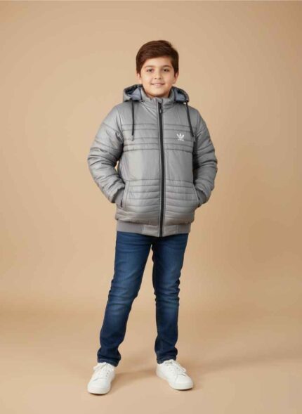 Front view of a black parachute jacket for kids featuring a hood and zipper. Stylish green winter jacket for boys displayed on a neutral background. Close-up shot of the stitched parachute material and Gelani brand detailing. Boy's winter puffer style jacket in black color for Pakistan weather. Durable green outdoor jacket for children suitable for winter sports. parachute jacket for boy
