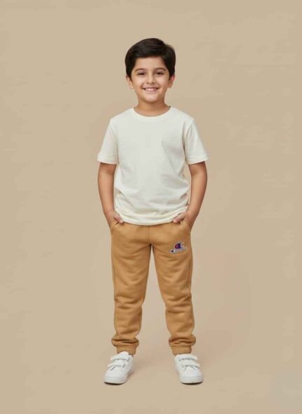 Kids-brown-terry-winter-trousers-front-viewClose-up-of-brown-terry-fabric-and-drawstringKids-jogger-pants-with-ribbed-ankle-cuffs-brownWarm-winter-trousers-for-kids-in-pakistanDetailed-view-of-waistband-on-kids-brown-joggersKids Brown Terry Winter Trousers in Pakistan