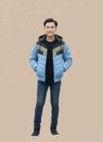 Front view of a black and tan stitched winter jacket for boys with a hood. Boy model wearing a sky blue and black puffer style parachute jacket. Lime green and black winter outerwear for kids by Gelani brand. Grey quilted parachute jacket with zipper and hood for winter protection. Durable stitched parachute fabric detail on a colorful boys winter coat. parachute jacket for boy