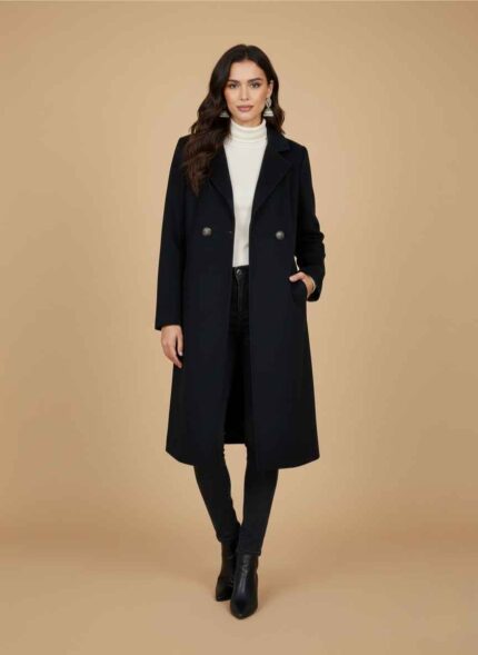 Front view of a black stitched long coat for women in premium fleece. Elegant cream-colored winter coat for women with double-button detail. Close-up of the fleece material and collar stitching on a Gelani's women's coat. Full-length view of a formal black winter coat for ladies in Pakistan. Soft cream fleece long coat for women available in plus sizes M to XXXL. long coat for women