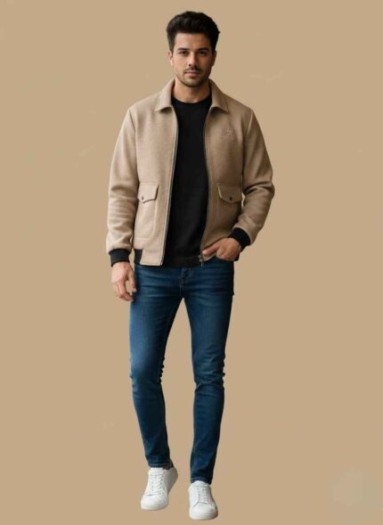 Gelani's skin color fleece jacket for men with front zipper and black cuffs Light skin tone stitched winter fleece jacket for men side view Close-up of premium fleece material on Gelani's men's winter coat Men's casual winter fleece jacket in light skin color Pakistan Gelani's branded fleece jacket for men showing collar and pocket detail fleece jacket for men